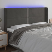 sengegavl med LED-lys 203x16x118/128 cm fløjl mørkegrå