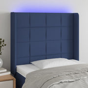 sengegavl med LED-lys 83x16x118/128 cm stof blå