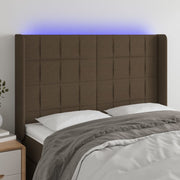 sengegavl med LED-lys 147x16x118/128 cm stof mørkebrun