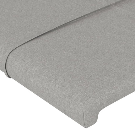 sengegavl med LED-lys 203x16x118/128 cm stof lysegrå