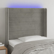 sengegavl med LED-lys 93x16x118/128 cm fløjl lysegrå