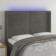 sengegavl med LED-lys 147x16x118/128 cm fløjl mørkegrå