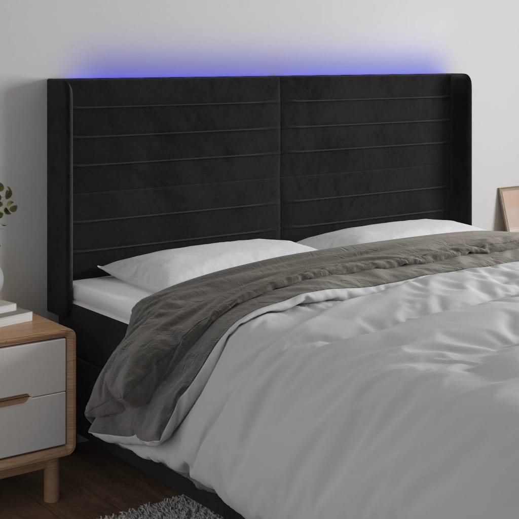sengegavl med LED-lys 163x16x118/128 cm fløjl sort