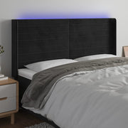 sengegavl med LED-lys 163x16x118/128 cm fløjl sort