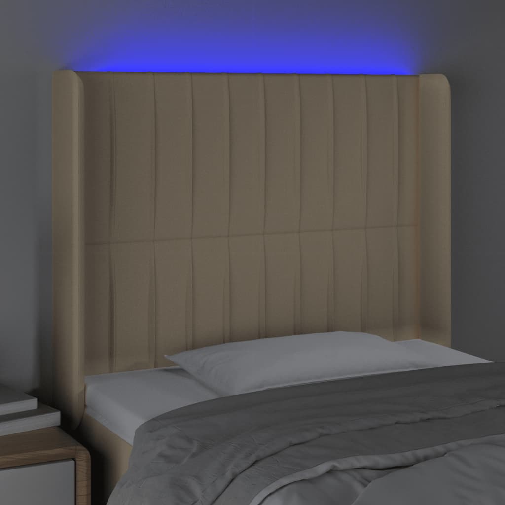 sengegavl med LED-lys 83x16x118/128 cm stof cremefarvet