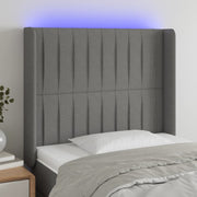 sengegavl med LED-lys 93x16x118/128 cm stof mørkegrå