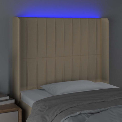 sengegavl med LED-lys 93x16x118/128 cm stof cremefarvet
