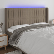 sengegavl med LED-lys 163x16x118/128 cm stof gråbrun