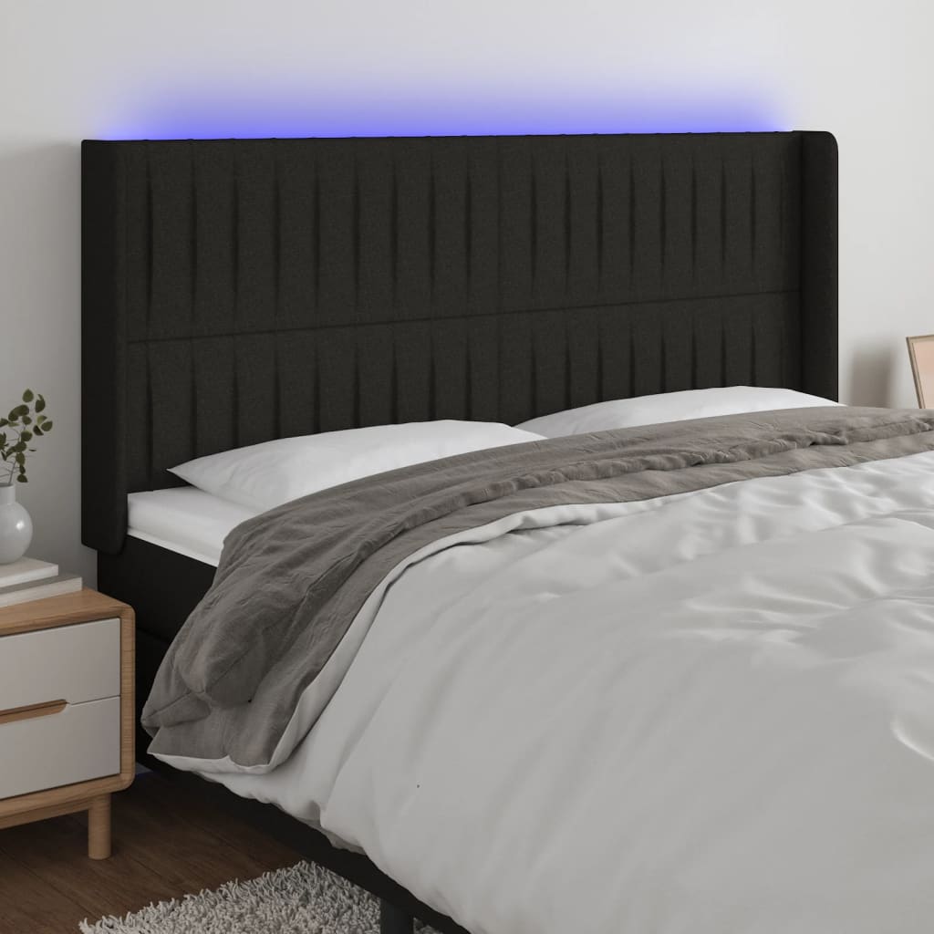 sengegavl med LED-lys 203x16x118/128 cm stof sort