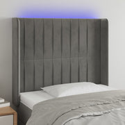 sengegavl med LED-lys 103x16x118/128 cm fløjl lysegrå