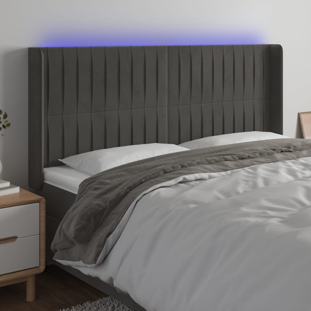 sengegavl med LED-lys 163x16x118/128 cm fløjl mørkegrå