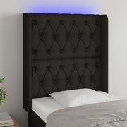 sengegavl med LED-lys 83x16x118/128 cm stof sort