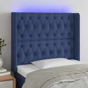 sengegavl med LED-lys 103x16x118/128 cm stof blå