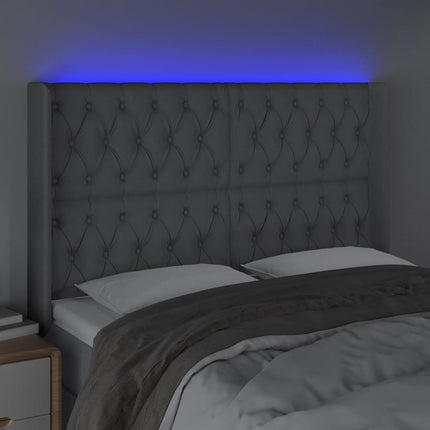 sengegavl med LED-lys 147x16x118/128 cm stof lysegrå