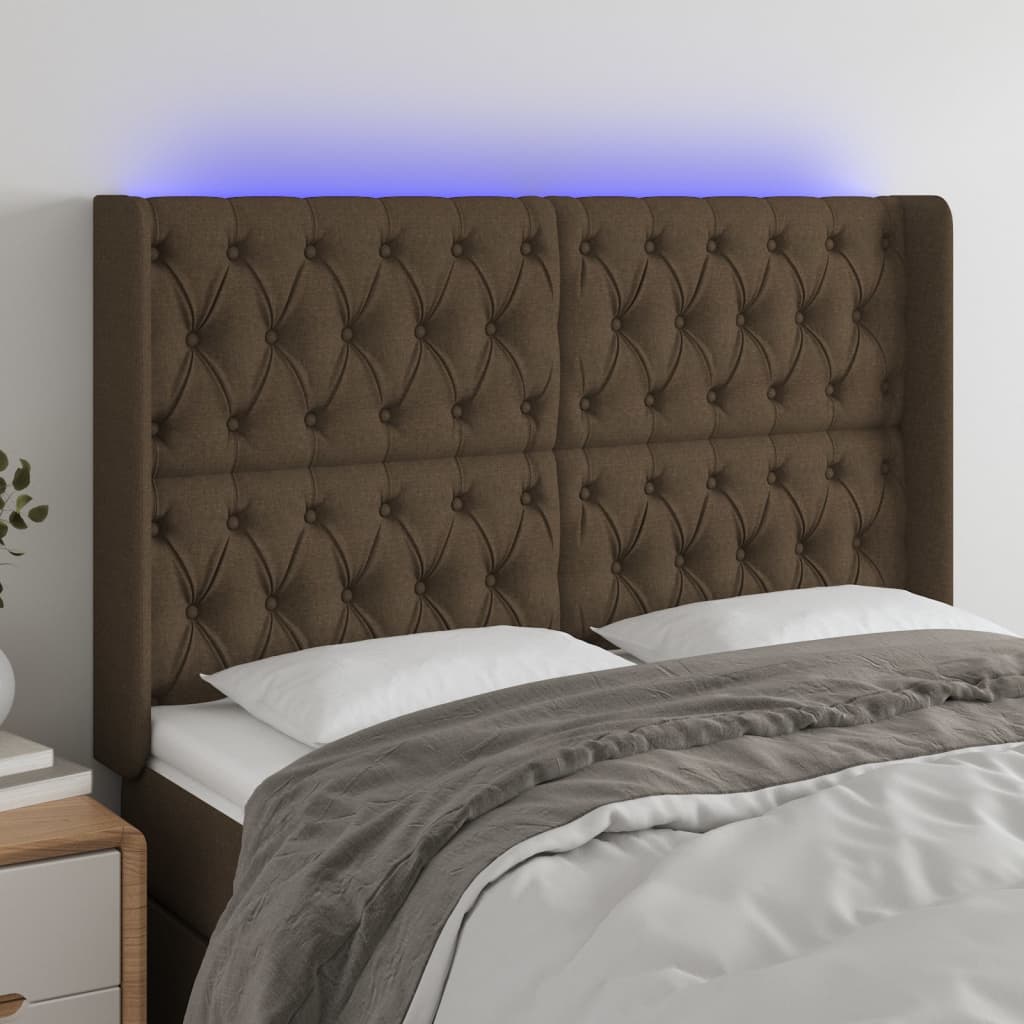 sengegavl med LED-lys 163x16x118/128 cm stof mørkebrun