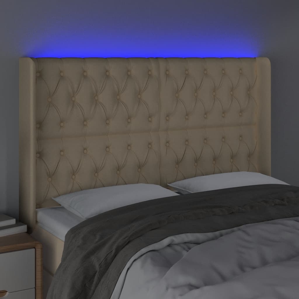 sengegavl med LED-lys 163x16x118/128 cm stof cremefarvet