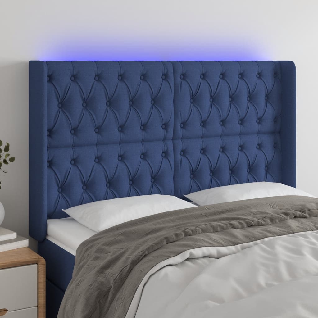 sengegavl med LED-lys 163x16x118/128 cm stof blå