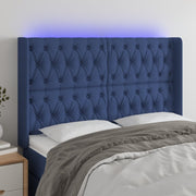 sengegavl med LED-lys 163x16x118/128 cm stof blå