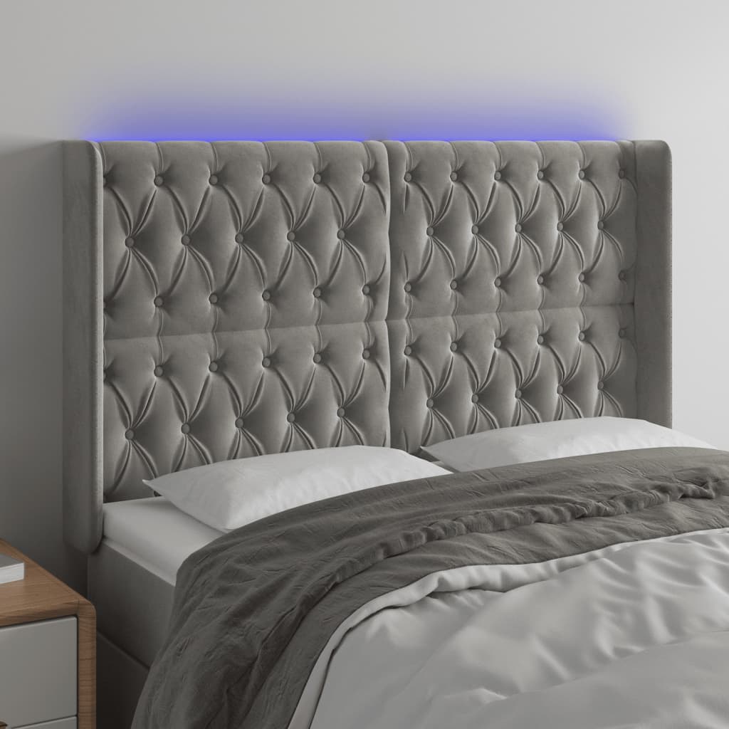 sengegavl med LED-lys 163x16x118/128 cm fløjl lysegrå