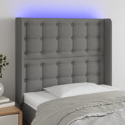 sengegavl med LED-lys 83x16x118/128 cm stof mørkegrå