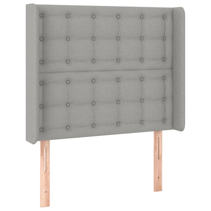 sengegavl med LED-lys 103x16x118/128 cm stof lysegrå