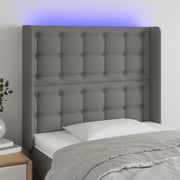 sengegavl med LED-lys 103x16x118/128 cm stof mørkegrå
