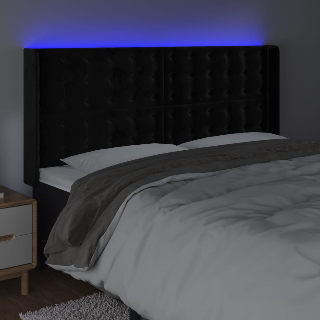 sengegavl med LED-lys 163x16x118/128 cm fløjl sort