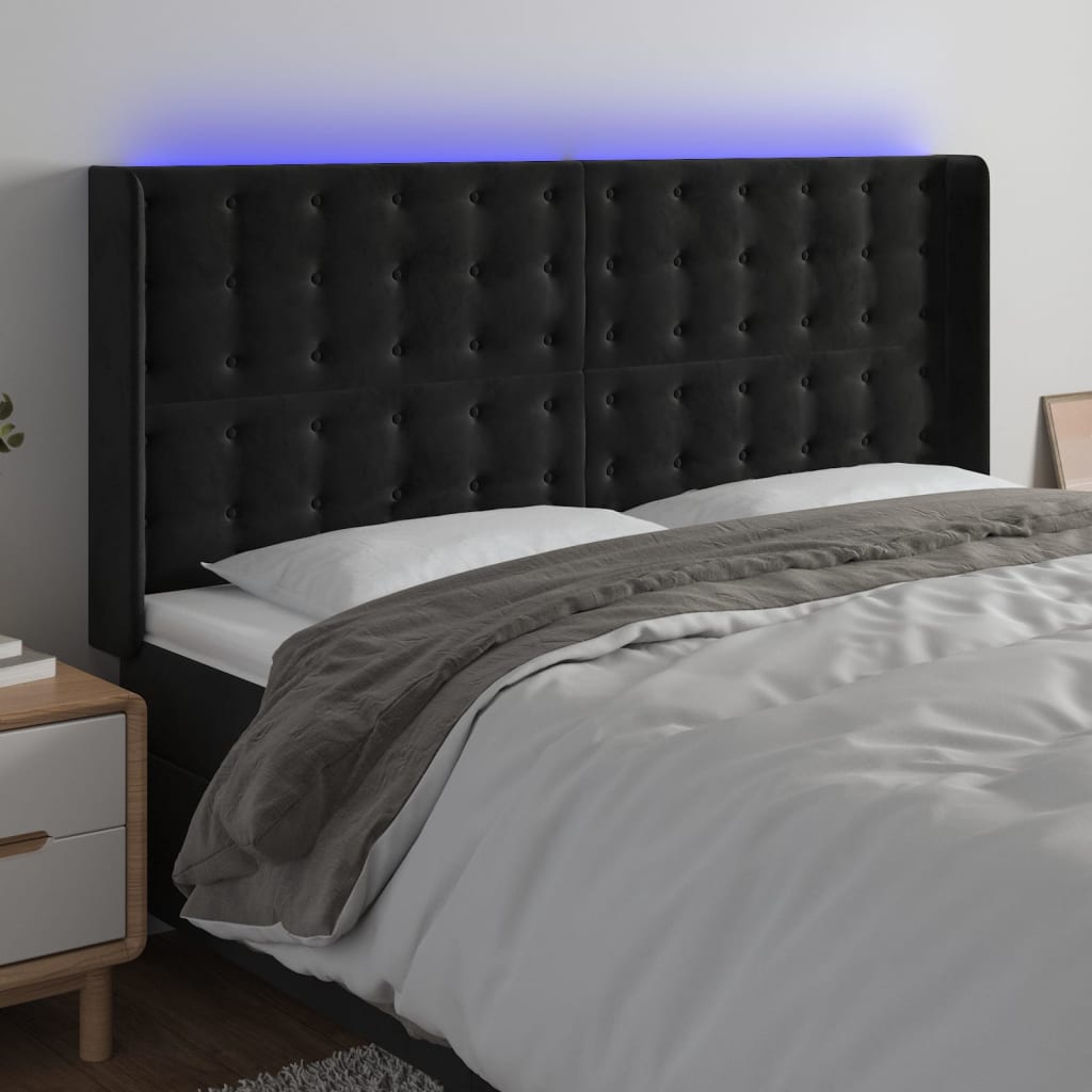 sengegavl med LED-lys 163x16x118/128 cm fløjl sort
