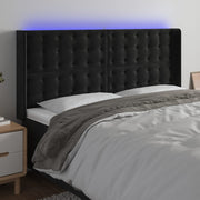 sengegavl med LED-lys 163x16x118/128 cm fløjl sort