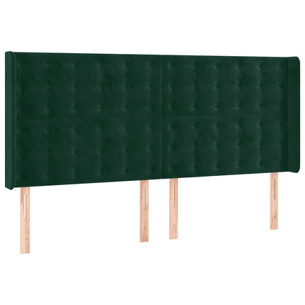 sengegavl med LED-lys 163x16x118/128 cm fløjl mørkegrøn