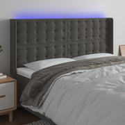 sengegavl med LED-lys 203x16x118/128 cm fløjl mørkegrå