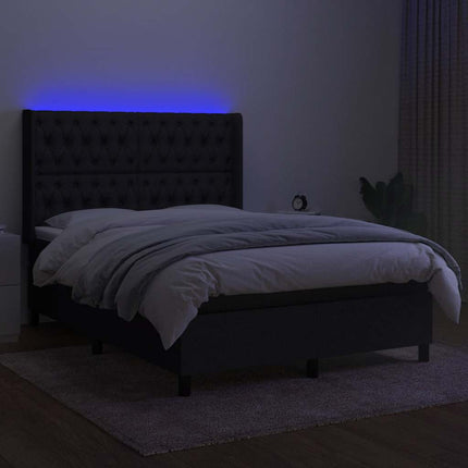 kontinentalseng med LED-lys 140x200 cm stof sort