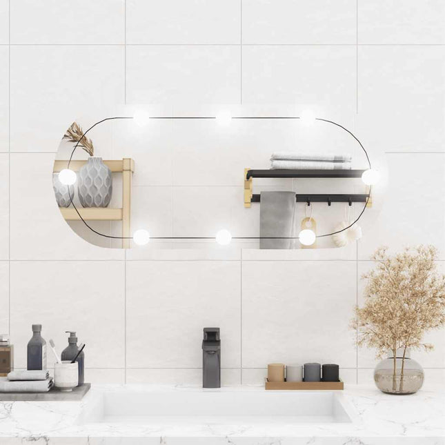 vægspejl med LED-lys 35x80 cm oval glas
