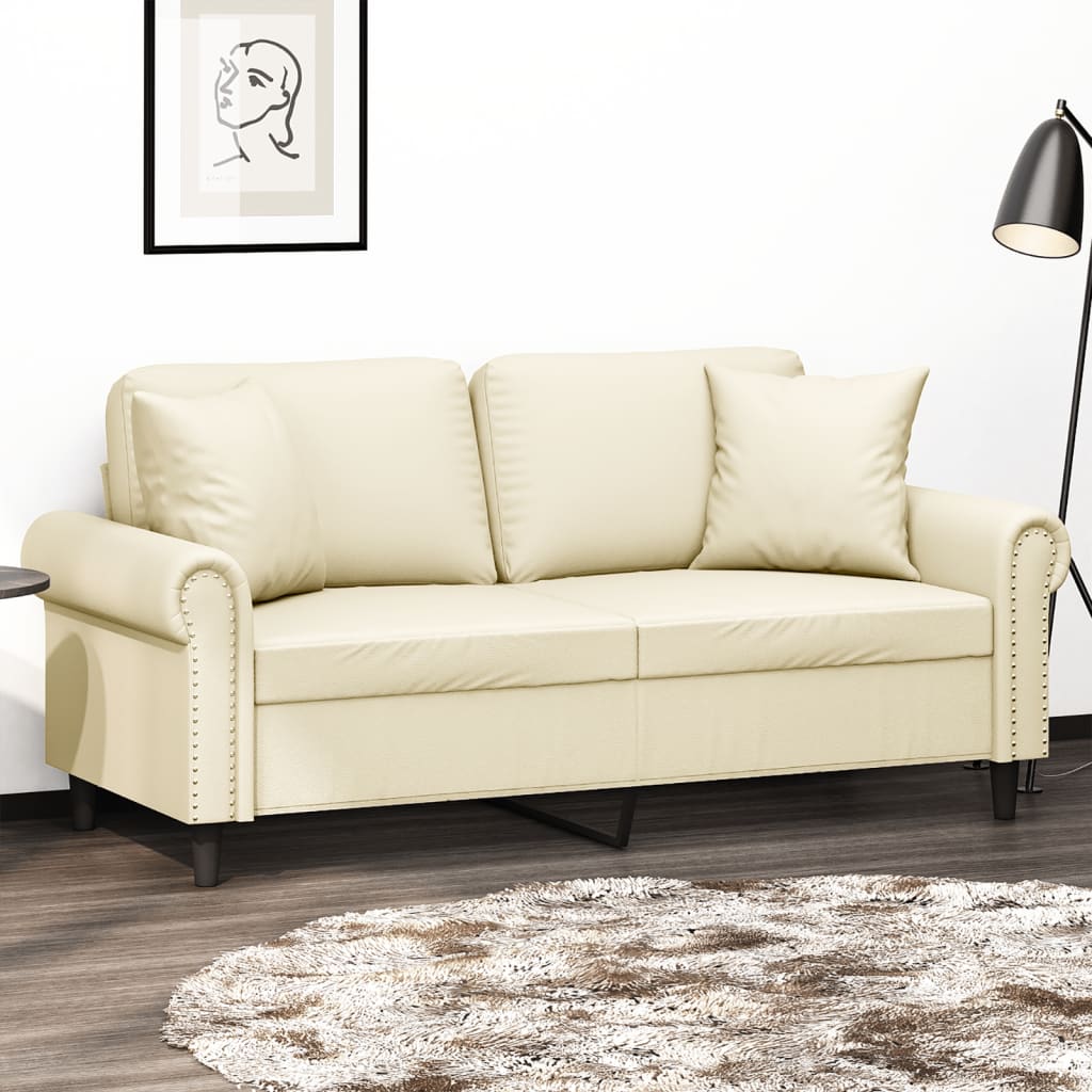 2-personers sofa med pyntepuder 140 cm kunstlder cremefarvet