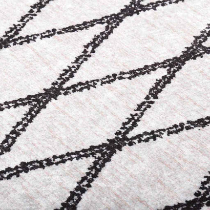 gulvtæppe 120x170 cm vaskbart sort og hvid