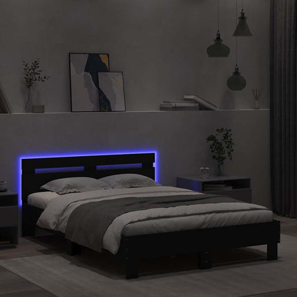 sengeramme med sengegavl og LED-lys 120x200 cm sort