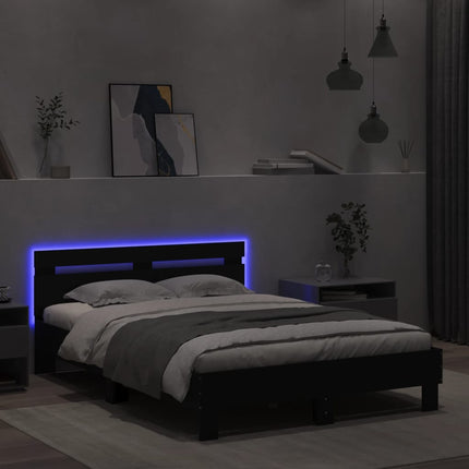 sengeramme med sengegavl og LED-lys 135x190 cm sort