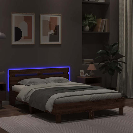 sengeramme med sengegavl og LED-lys 135x190 cm brunt egetræ