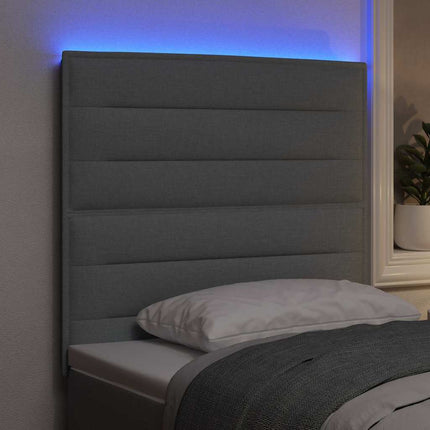 LED sengegavl med LED-lysstrimler Lysegrå 100 cm Stof