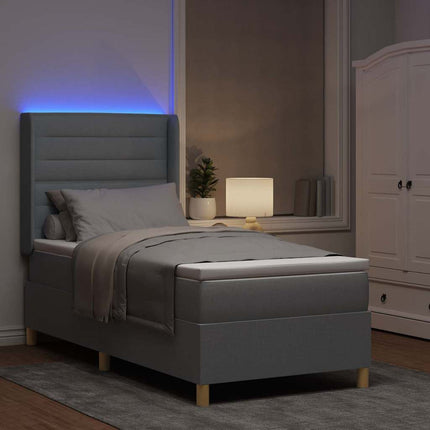 Box spring seng med LED-lysstrimler Lysegrå 90 x 200 cm Stof
