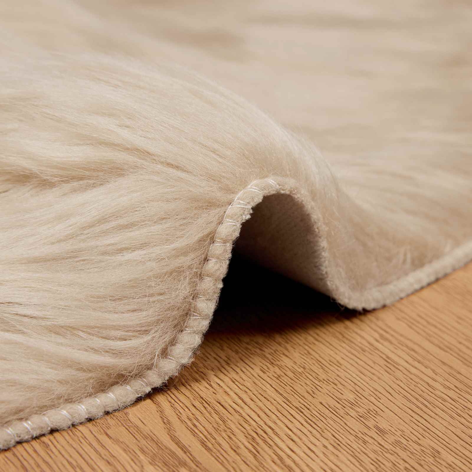 Fuskobbel lammeskindstæppe TAFALLA Beige Ø 100 cm Polyester