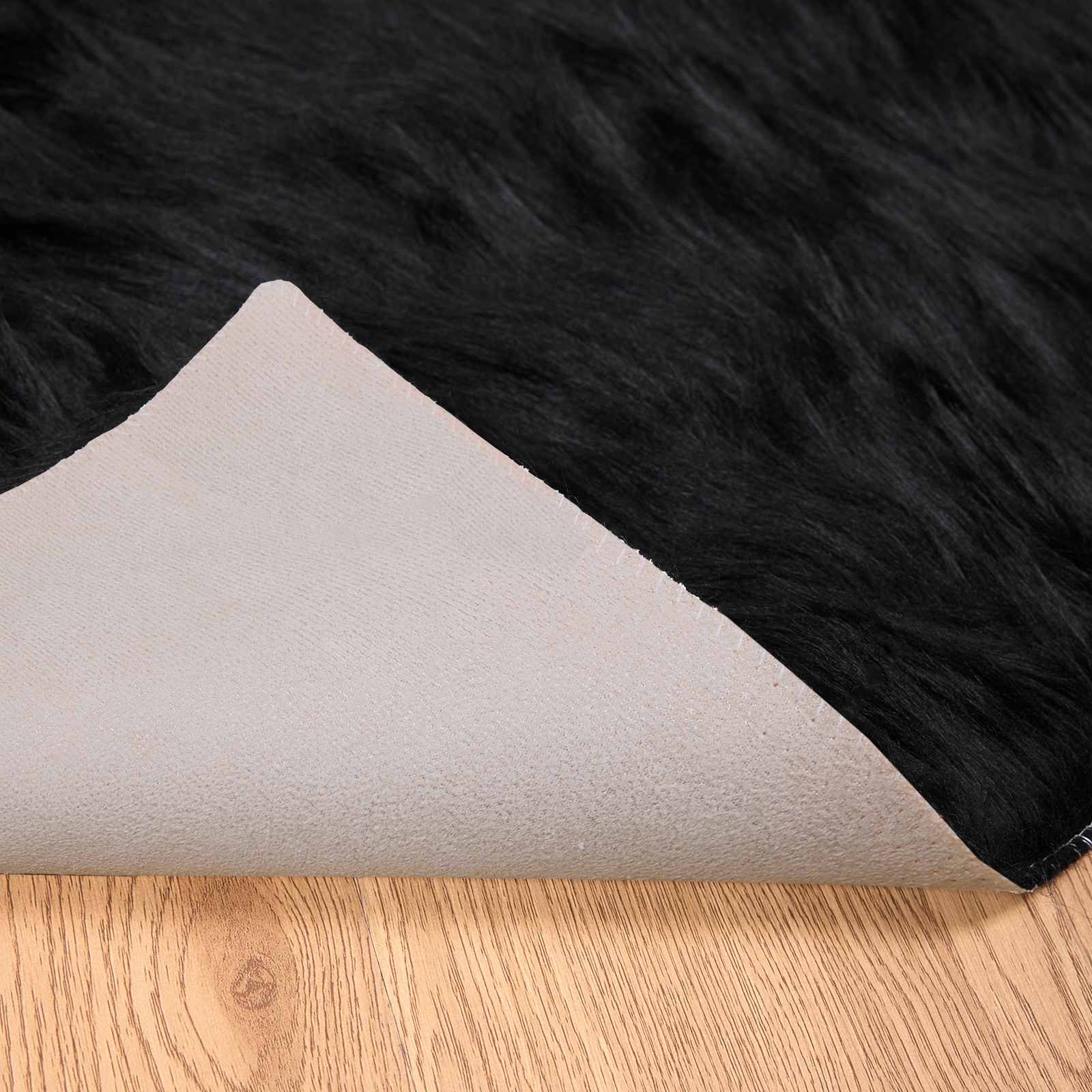 Fuskobbel lammeskindstæppe TAFALLA Sort 140 x 200 cm Polyester