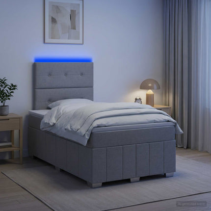 LED boksmadrasseng med madras Lysegrå 120 x 190 cm Stof