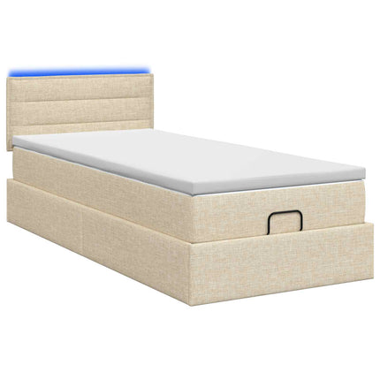 Ottoman seng med madras og LED Cremefarvet 90 x 190 cm Stof